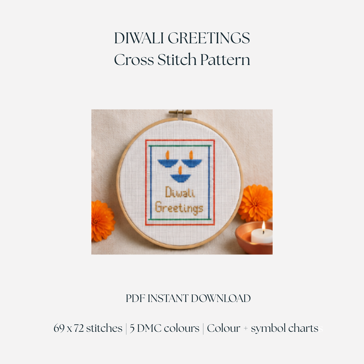 Blue, orange and gold Diwali diya cross stitch pattern finished in an embroidery hoop
